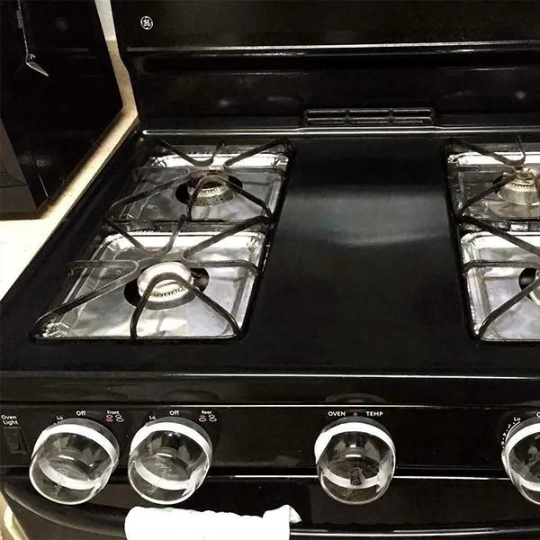 Gas Stove covered by Aluminium Foil